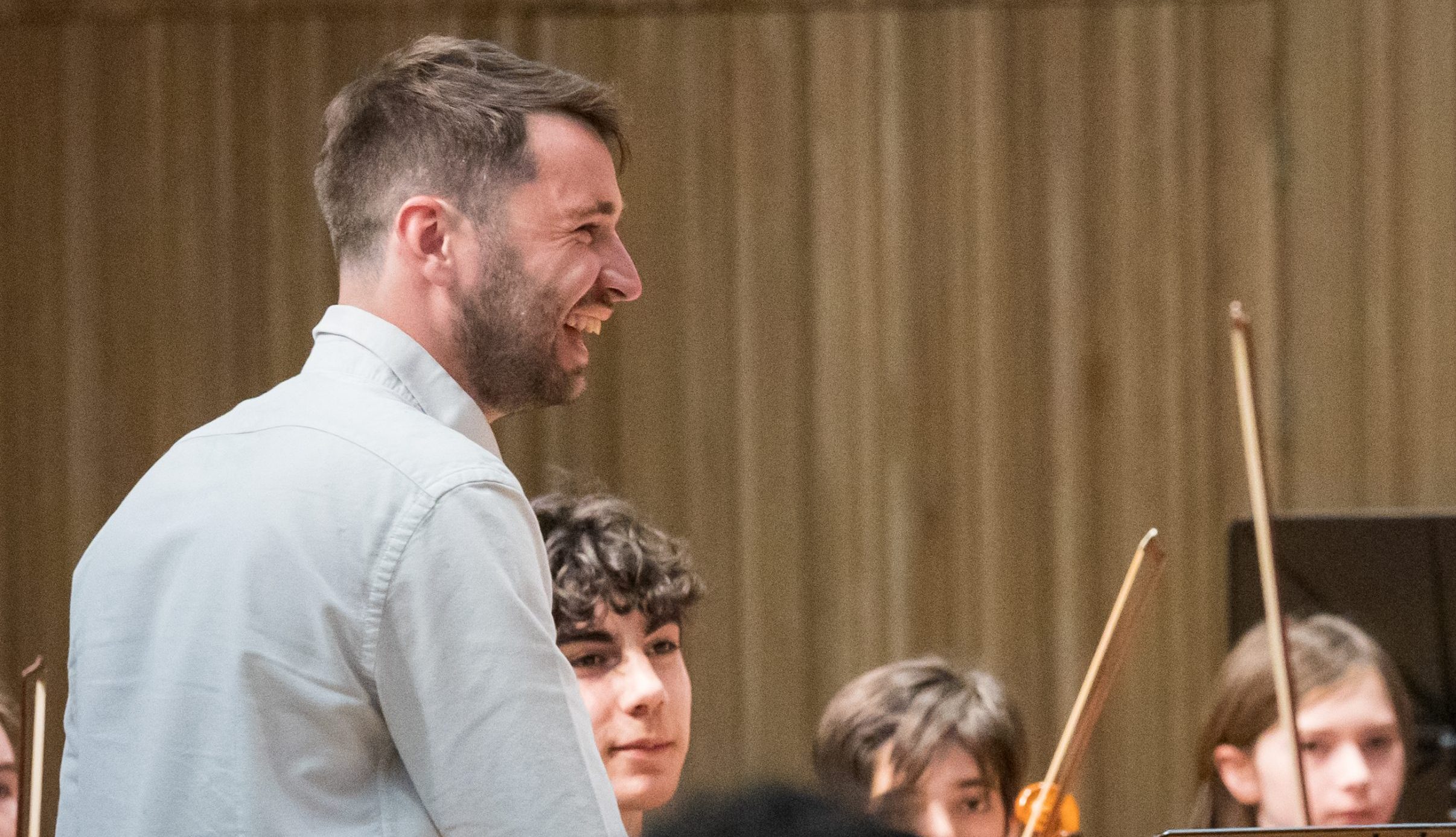 Teacher with student musicians