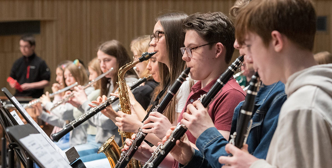 Students playing wind instruments