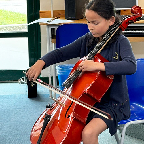 Emma playing cello