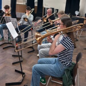 Group playing trombone